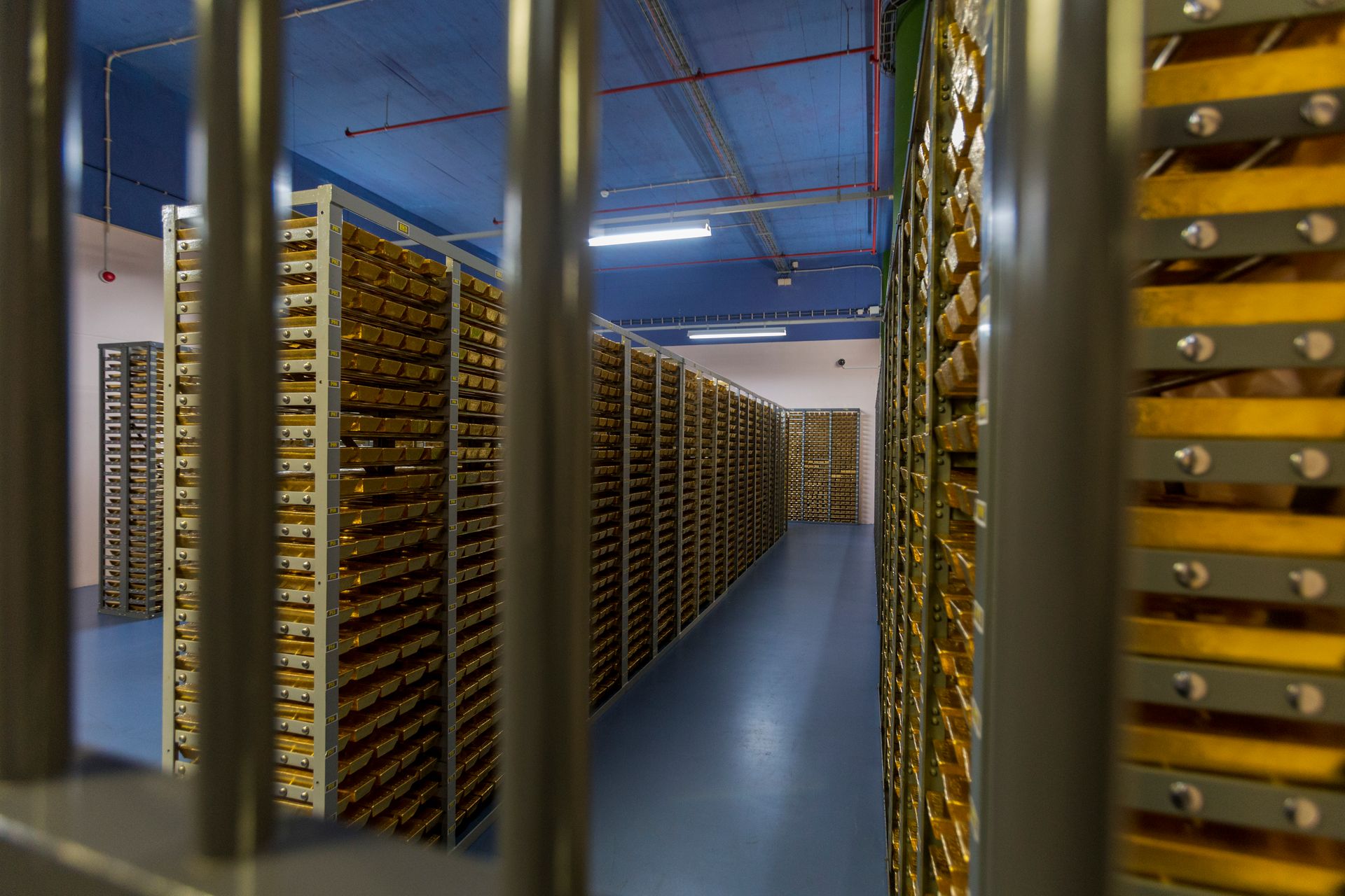 Secure vault room with gold bars